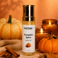 Bottle of Soft Pétalz Pumpkin Spice Body Oil with pumpkins, cinnamon sticks, and a candle in the background.